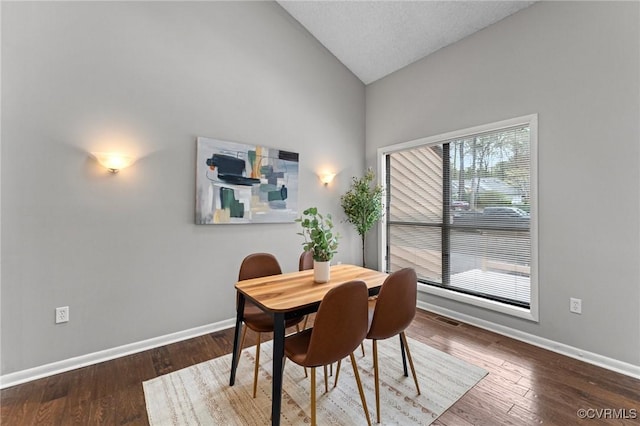 14323 Spring Gate Ct, Chesterfield, VA 23112 - dining area featuring lofted ceiling, baseboards, and wood finished floors