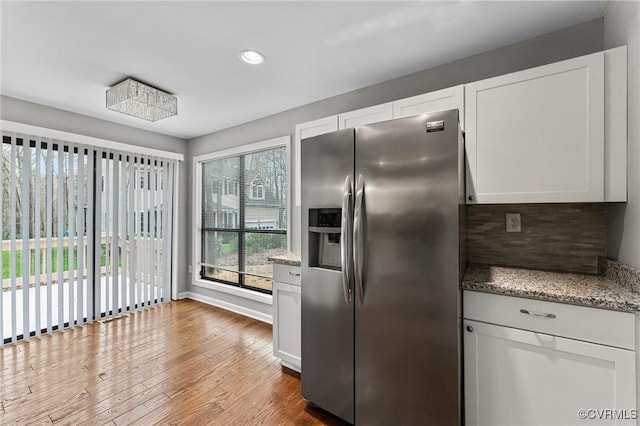 14323 Spring Gate Ct, Chesterfield, VA 23112 - kitchen featuring stainless steel fridge, decorative backsplash, wood finished floors, white cabinets, and recessed lighting