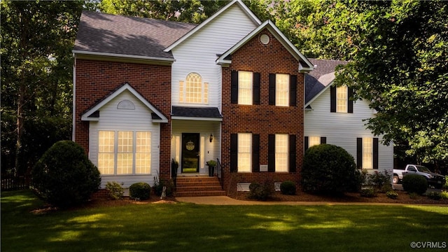 5158 Keitts Corner Rd, Mechanicsville, VA 23111 - view of front facade featuring a front lawn, brick siding, and a shingled roof