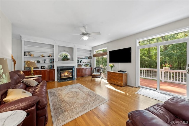 5158 Keitts Corner Rd, Mechanicsville, VA 23111 - living room with ceiling fan, light wood-style flooring, and a premium fireplace
