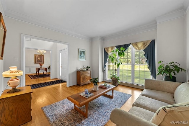5158 Keitts Corner Rd, Mechanicsville, VA 23111 - living room with a chandelier, crown molding, and light wood finished floors