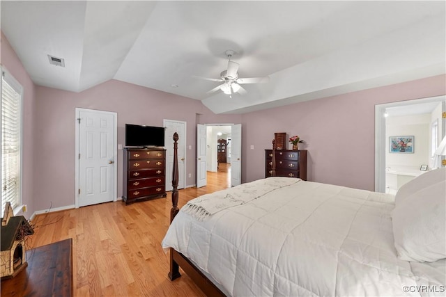 5158 Keitts Corner Rd, Mechanicsville, VA 23111 - bedroom featuring lofted ceiling, light wood-style floors, ensuite bathroom, and a ceiling fan