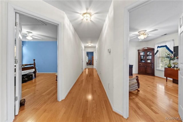 5158 Keitts Corner Rd, Mechanicsville, VA 23111 - hallway featuring light wood finished floors and attic access