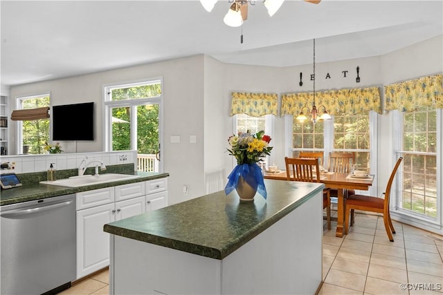5158 Keitts Corner Rd, Mechanicsville, VA 23111 - kitchen featuring dishwasher, dark countertops, light tile patterned floors, white cabinetry, and ceiling fan