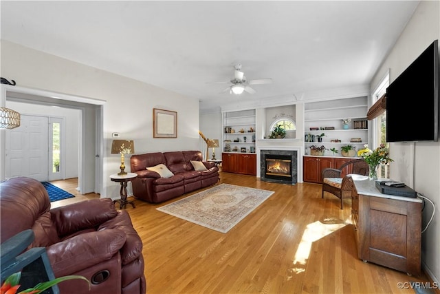 5158 Keitts Corner Rd, Mechanicsville, VA 23111 - living area featuring a ceiling fan, light wood finished floors, and a fireplace