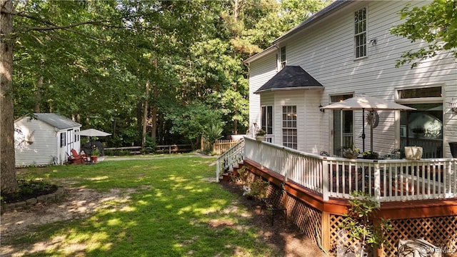5158 Keitts Corner Rd, Mechanicsville, VA 23111 - view of green lawn with a wooden deck and an outdoor structure