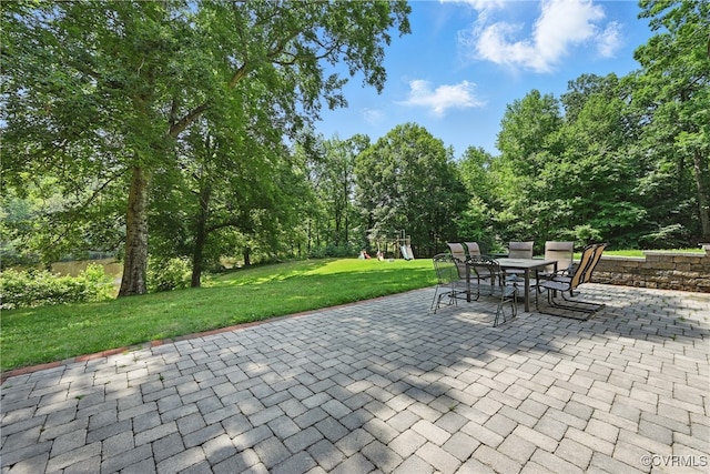 14401 Doctors Creek Rd, Lanexa, VA 23089 - view of patio featuring a playground and outdoor dining space