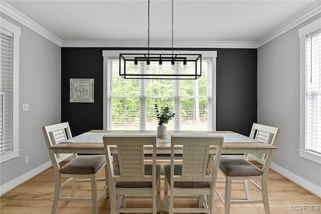 16319 Aklers Pl, Moseley, VA 23832 - dining room featuring healthy amount of natural light, crown molding, baseboards, and light wood finished floors