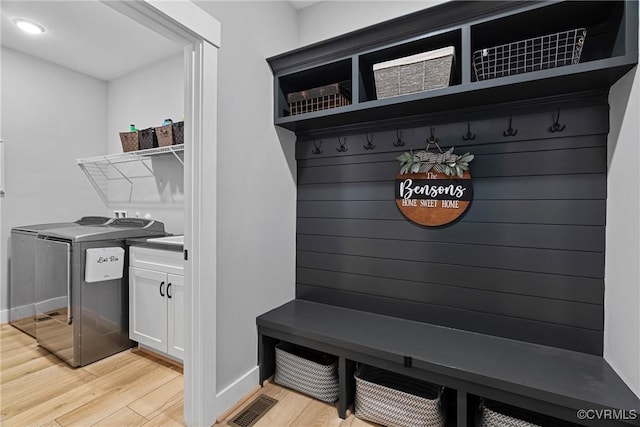 16319 Aklers Pl, Moseley, VA 23832 - mudroom with light wood-type flooring, washer and clothes dryer, and baseboards
