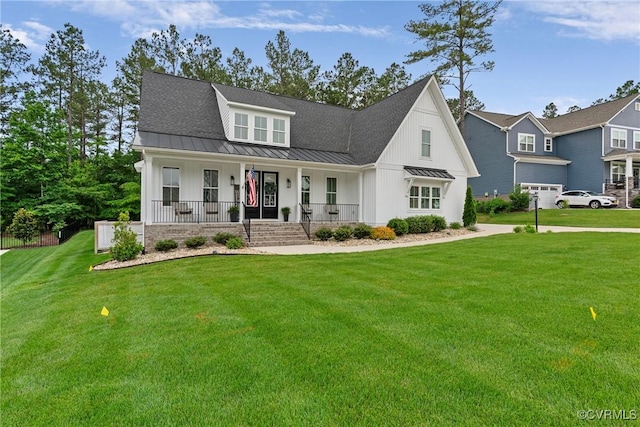 16319 Aklers Pl, Moseley, VA 23832 - modern farmhouse style home with a standing seam roof, a porch, and a front yard