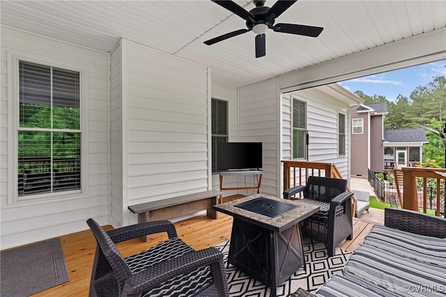 16319 Aklers Pl, Moseley, VA 23832 - wooden deck with a ceiling fan and an outdoor living space with a fire pit