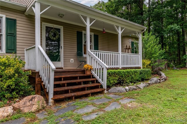 24390 Genito Rd, Amelia Courthouse, VA 23002 - entrance to property with covered porch and a yard