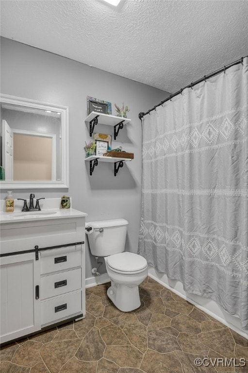 24390 Genito Rd, Amelia Courthouse, VA 23002 - full bathroom featuring toilet, vanity, and a textured ceiling