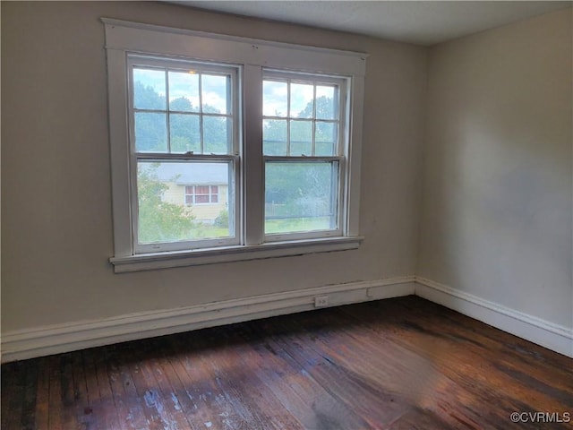 5308 Parker St, Richmond, VA 23231 - empty room featuring healthy amount of natural light and dark wood finished floors