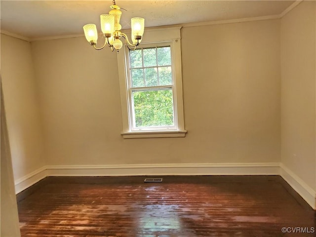 5308 Parker St, Richmond, VA 23231 - spare room featuring a chandelier, dark wood finished floors, ornamental molding, and baseboards