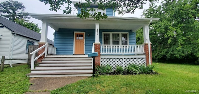5308 Parker St, Richmond, VA 23231 - view of front of property with covered porch and a front lawn
