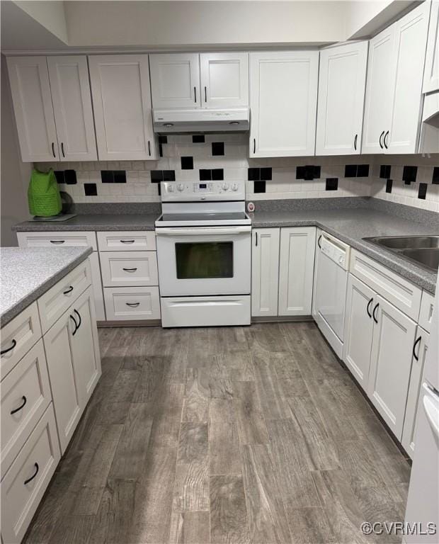 12003 Warrington Ct Unit 12003, Henrico, VA 23233 - kitchen featuring white appliances, under cabinet range hood, wood finished floors, and white cabinetry