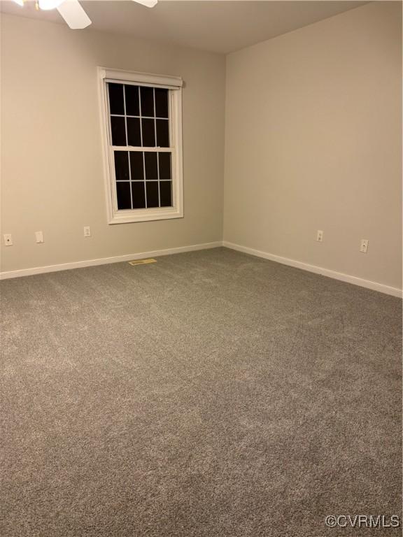 12003 Warrington Ct Unit 12003, Henrico, VA 23233 - spare room with dark colored carpet, baseboards, and ceiling fan