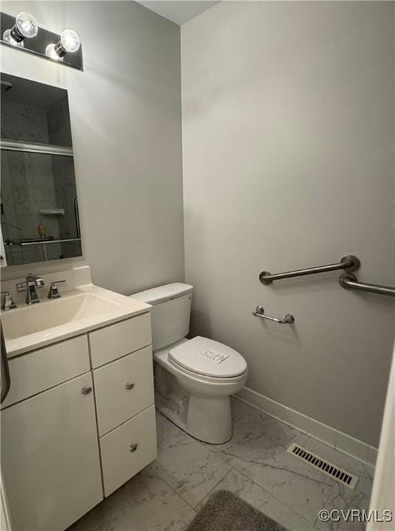 12003 Warrington Ct Unit 12003, Henrico, VA 23233 - bathroom with marble finish floors, vanity, toilet, a shower stall, and baseboards