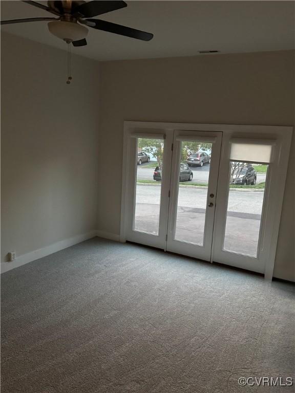 12003 Warrington Ct Unit 12003, Henrico, VA 23233 - spare room featuring carpet floors, a ceiling fan, baseboards, and french doors