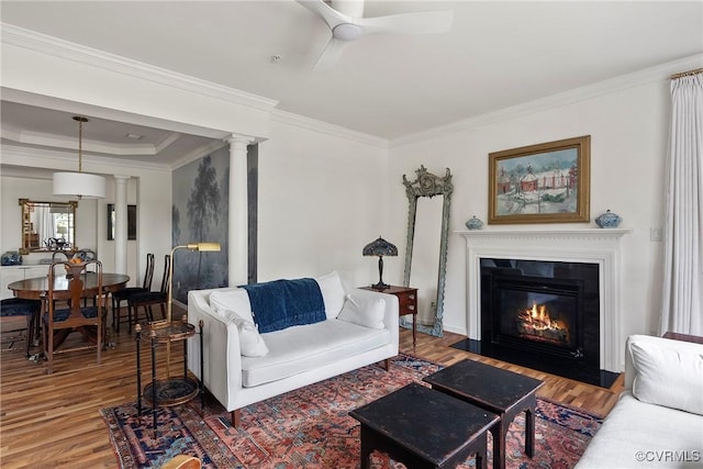 3401 Coles Point Way Unit A, Henrico, VA 23060 - living room featuring wood finished floors, ornamental molding, ceiling fan, a fireplace with flush hearth, and ornate columns