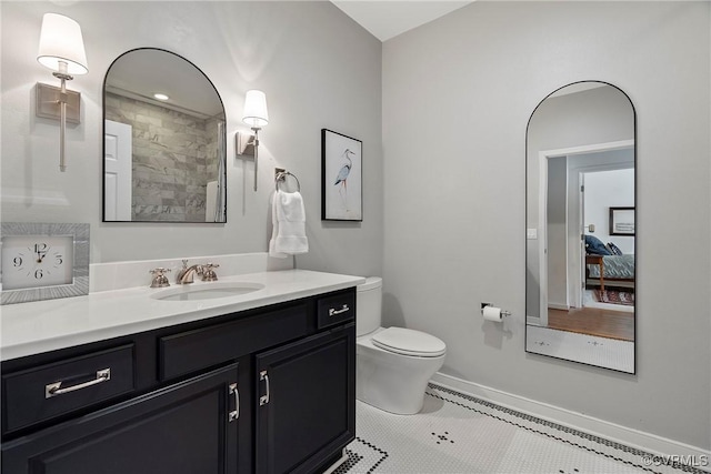 3401 Coles Point Way Unit A, Henrico, VA 23060 - bathroom featuring vanity, tile patterned floors, toilet, baseboards, and a shower