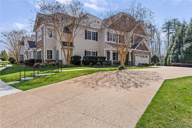 3401 Coles Point Way Unit A, Henrico, VA 23060 - view of front of home with curved driveway, a front lawn, a garage, and stone siding