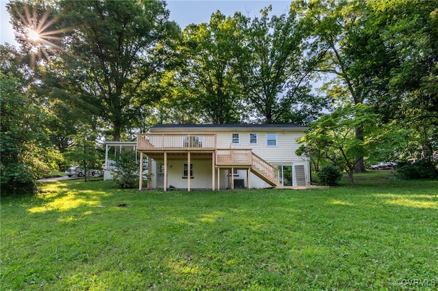 3411 Sylvania Rd, Chester, VA 23831 - back of property with stairs, a deck, and a yard