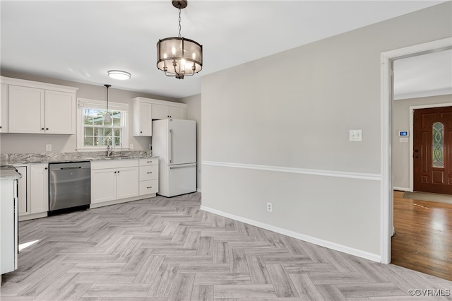 3411 Sylvania Rd, Chester, VA 23831 - kitchen with stainless steel dishwasher, freestanding refrigerator, a chandelier, white cabinetry, and hanging light fixtures