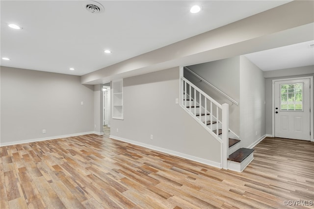 3411 Sylvania Rd, Chester, VA 23831 - basement with light wood-type flooring, recessed lighting, stairs, and baseboards
