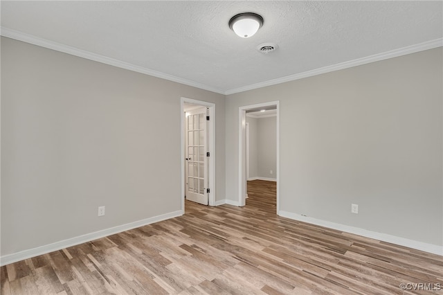 3411 Sylvania Rd, Chester, VA 23831 - spare room with light wood finished floors, baseboards, crown molding, and a textured ceiling