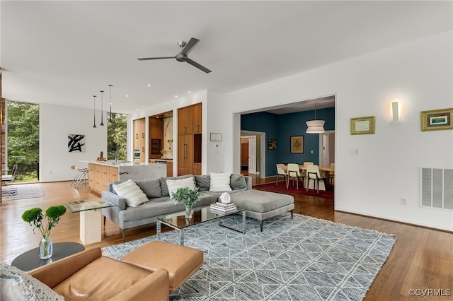 912 S Gaskins Rd, Henrico, VA 23238 - living area with light wood-type flooring and ceiling fan