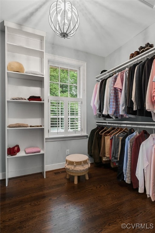 912 S Gaskins Rd, Henrico, VA 23238 - walk in closet with a chandelier and wood finished floors
