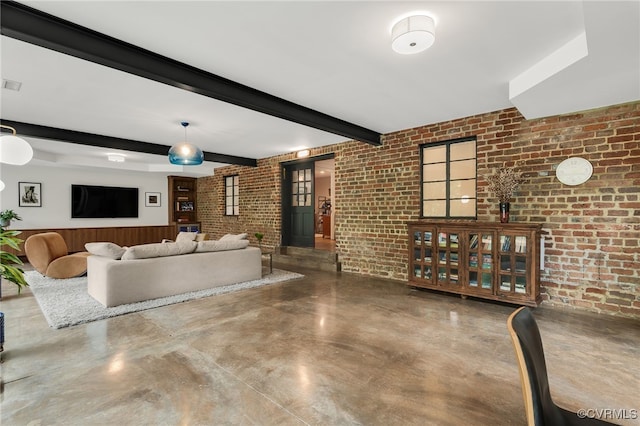 912 S Gaskins Rd, Henrico, VA 23238 - living room with brick wall, finished concrete floors, and beamed ceiling