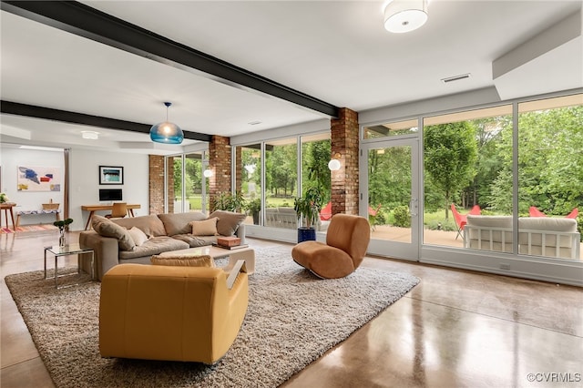 912 S Gaskins Rd, Henrico, VA 23238 - living area featuring plenty of natural light, beamed ceiling, and concrete floors