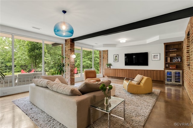 912 S Gaskins Rd, Henrico, VA 23238 - living area featuring concrete floors, a wainscoted wall, and beamed ceiling