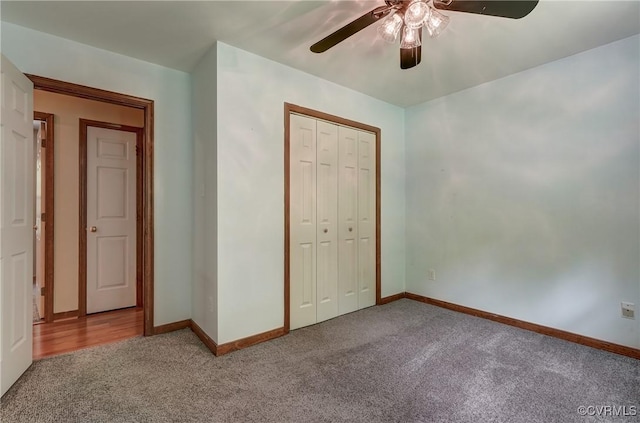 4509 Lockin Rd, Powhatan, VA 23139 - unfurnished bedroom with carpet floors, a closet, baseboards, and a ceiling fan