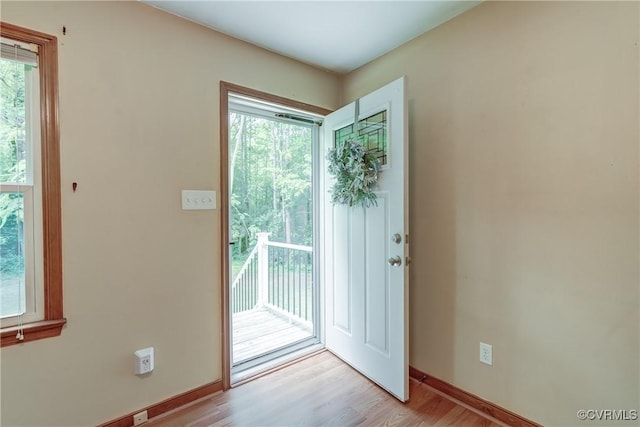 4509 Lockin Rd, Powhatan, VA 23139 - doorway to outside featuring wood finished floors and baseboards