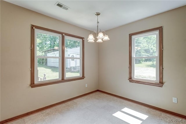 4509 Lockin Rd, Powhatan, VA 23139 - unfurnished room with a chandelier and baseboards