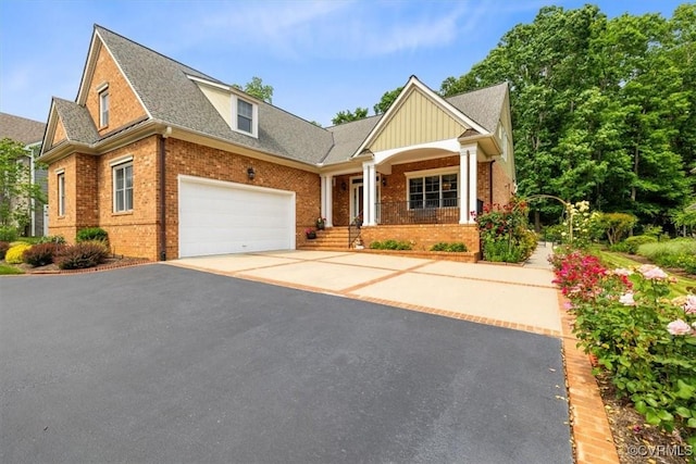 311 Victoria Way, Richmond, VA 23238 - craftsman house with brick siding, asphalt driveway, a garage, a porch, and roof with shingles