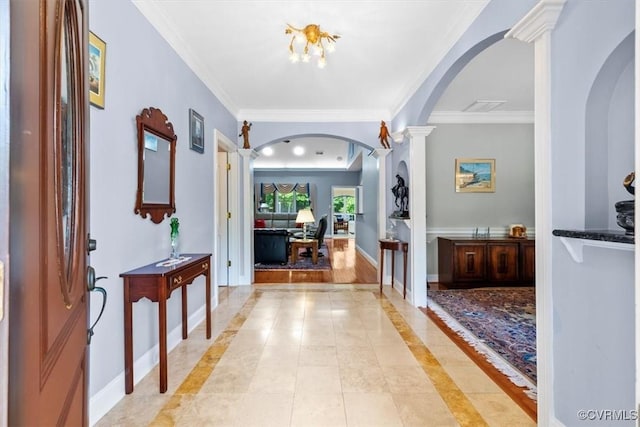 311 Victoria Way, Richmond, VA 23238 - entryway featuring decorative columns, arched walkways, light tile patterned floors, baseboards, and ornamental molding