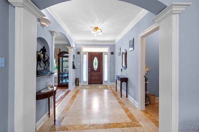 311 Victoria Way, Richmond, VA 23238 - foyer entrance featuring decorative columns, arched walkways, crown molding, baseboards, and light tile patterned flooring