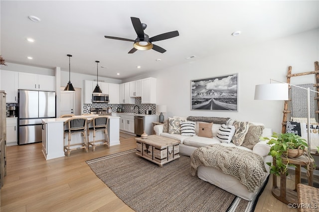 1900 Roseneath Rd Unit 8B, Richmond, VA 23230 - living area with a ceiling fan, light wood-style floors, and recessed lighting