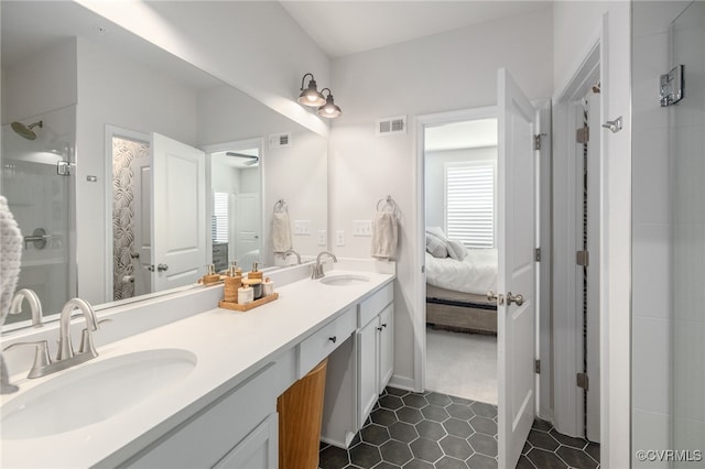1900 Roseneath Rd Unit 8B, Richmond, VA 23230 - ensuite bathroom featuring double vanity, a stall shower, and tile patterned flooring
