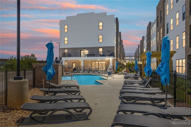 1900 Roseneath Rd Unit 8B, Richmond, VA 23230 - pool at dusk with a patio and a community pool