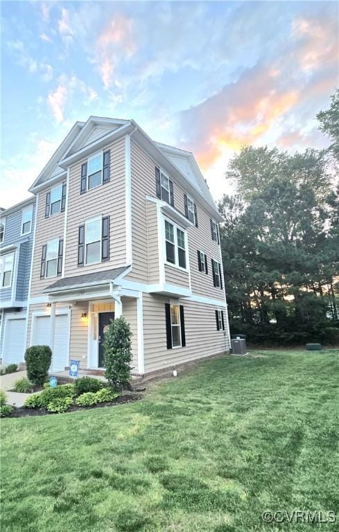 705 Prosperity Ct Unit 705, Williamsburg, VA 23188 - view of front facade with a front yard and central air condition unit