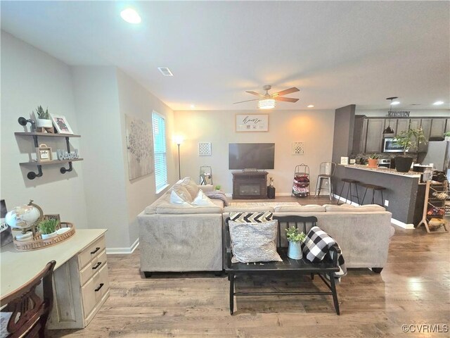 705 Prosperity Ct Unit 705, Williamsburg, VA 23188 - living room featuring a ceiling fan, light wood-style floors, recessed lighting, and baseboards