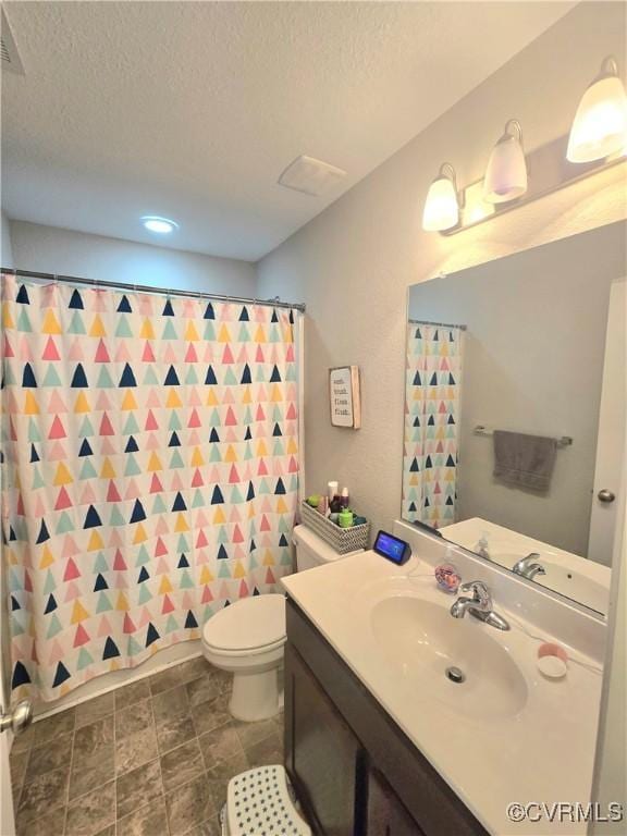 705 Prosperity Ct Unit 705, Williamsburg, VA 23188 - full bath with vanity, a textured ceiling, toilet, and a shower with shower curtain