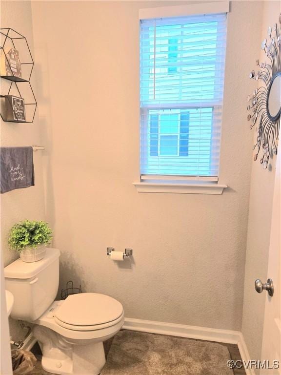 705 Prosperity Ct Unit 705, Williamsburg, VA 23188 - half bath featuring toilet, plenty of natural light, and baseboards