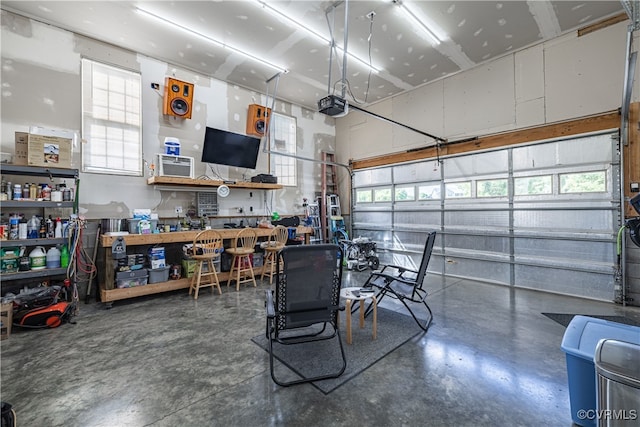 16180 Janet Dr, Amelia Courthouse, VA 23002 - garage featuring a workshop area and a garage door opener